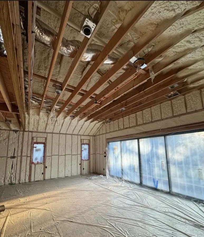 Interior walls and ceiling insulated with spray foam during new construction in Fishers
